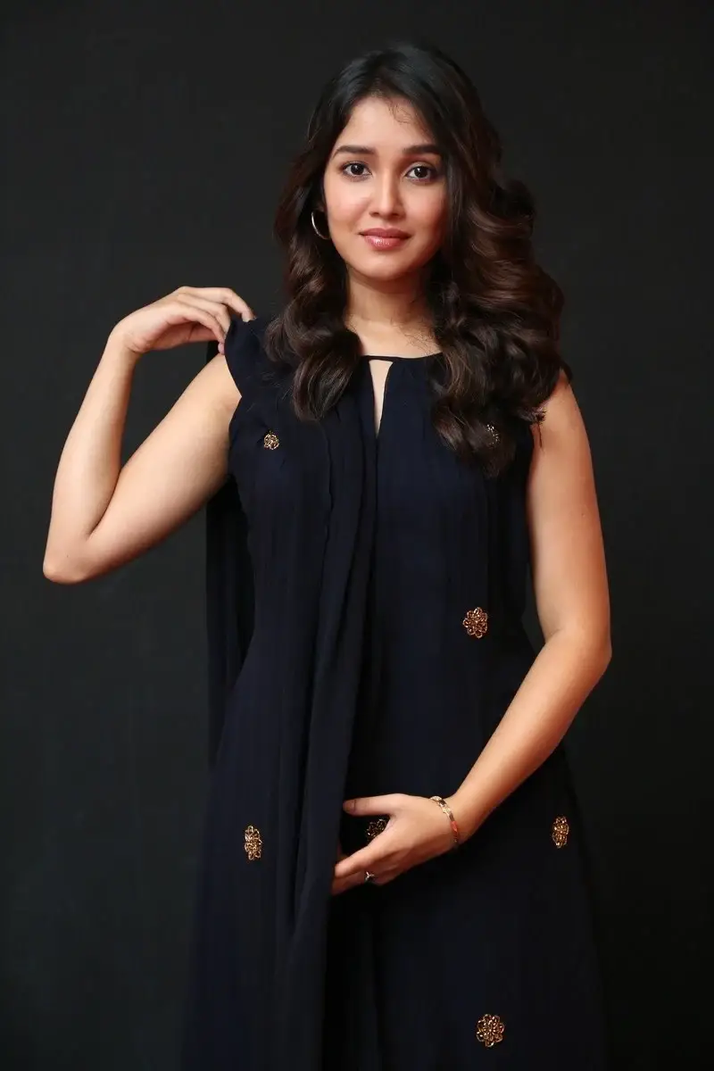 Actress Anikha Surendran in Black Dress at Butta Bomma Movie Trailer Launch